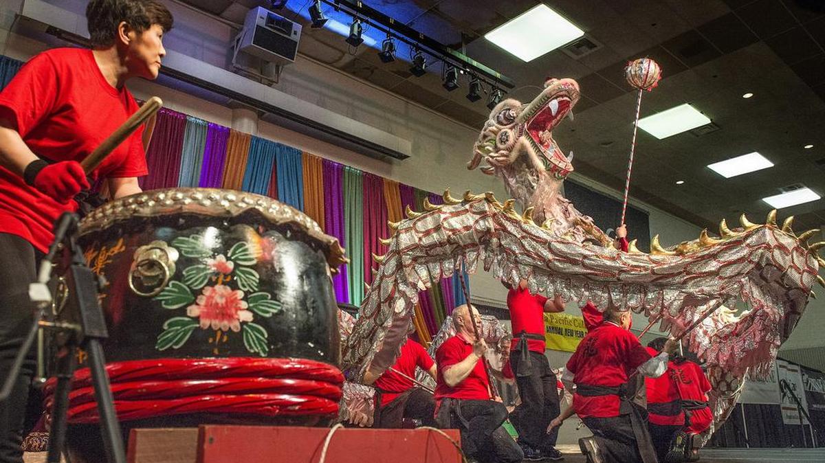 Lakewood resident drummer Alice Lee, left, originally of Taiwan, provided the rhythmic percussion for the Dragon Dance during the opening moments of the 17th annual Asia Pacific New Year Celebration at the Tacoma Dome Exhibition Hall in 2015.