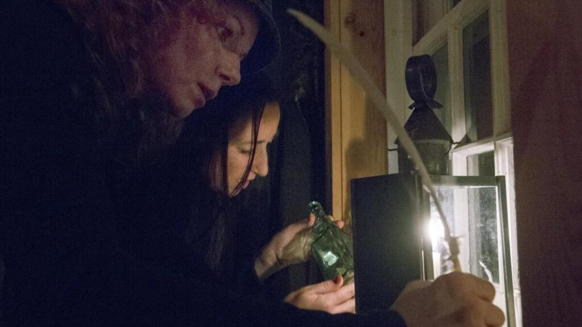 Manny Gnad writes down possible clues while Teresa Di Giulio searches for more during last year’s Trapped: Escape Fort Nisqually event at Fort Nisqually in Point Defiance Park.