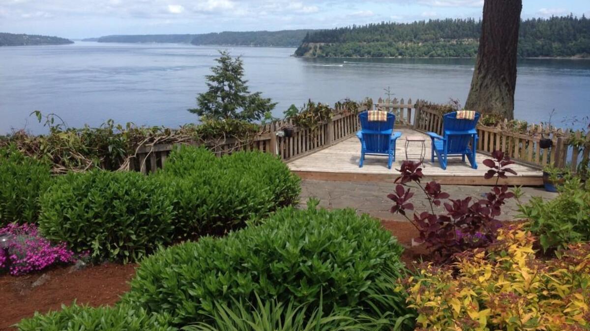The view of Point Defiance and Puget Sound from the Gig Harbor garden of Jan and Jeff Hohman, a past garden tour stop.