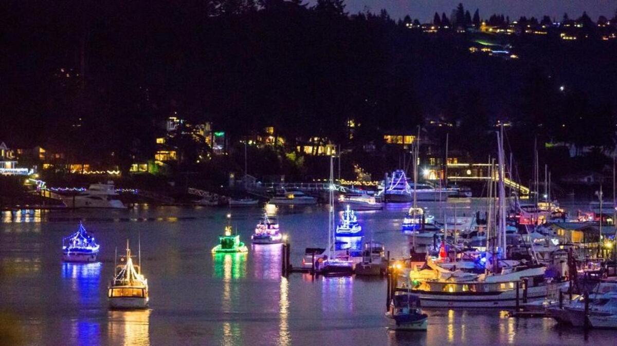 Boats fill the bay during the Lighted Boat Parade in Gig Harbor last year.