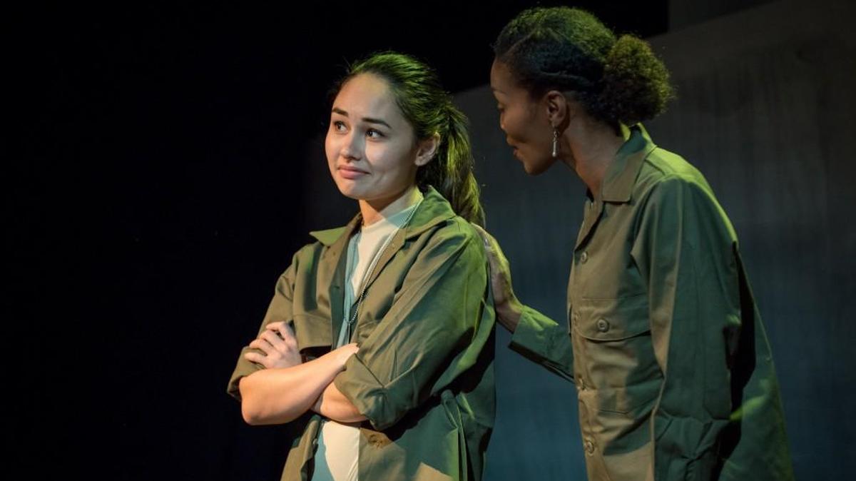 Helen Martin, left, as LeeAnn and LaNita Hudson, here playing LeeAnn’s superior, in “A Piece of My Heart” at Dukesbay Theater.