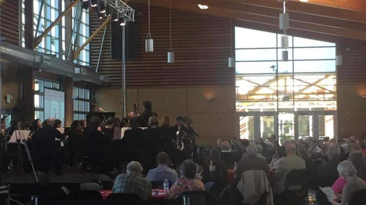 The Northwest Sinfonietta under Joseph Swensen plays in Pioneer Park Pavilion in Puyallup.