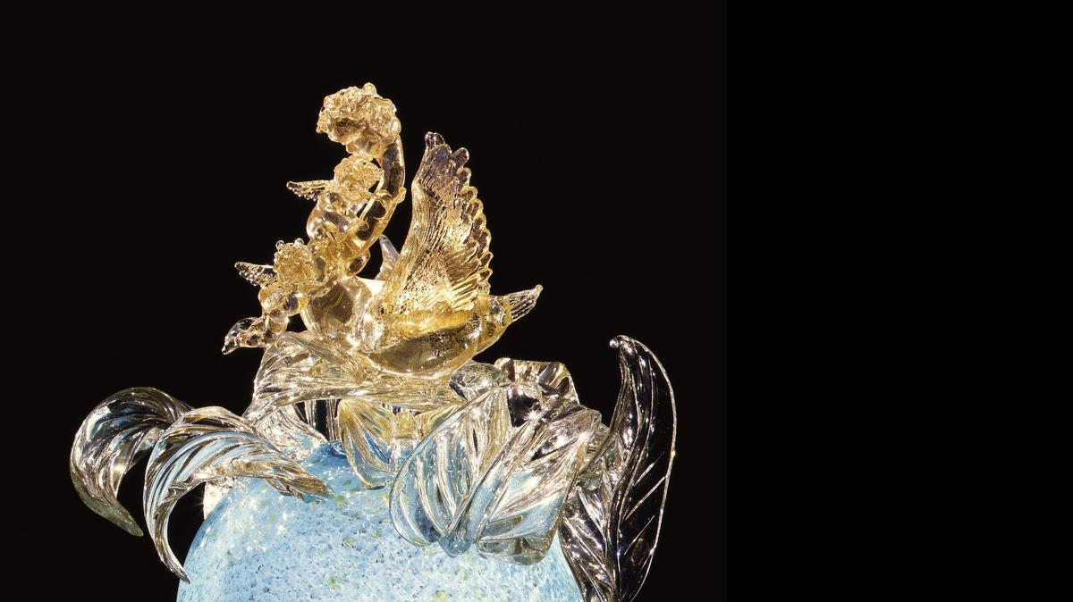 
Dale Chihuly, “Gilded Mystic Blue Venetians with Swan and Cherub.”
