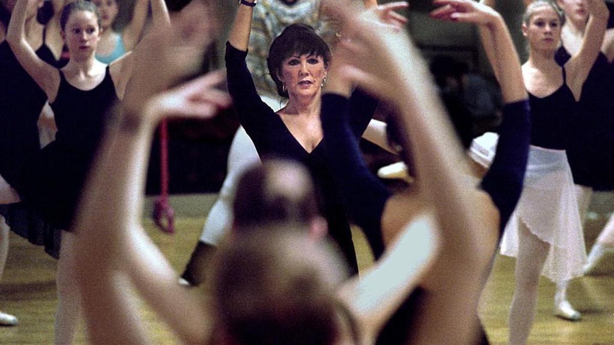 Jo Emery leads her students and dance company through their dance drills in front of the mirror in her Tacoma school studio in 2010. The school and company closed this summer.