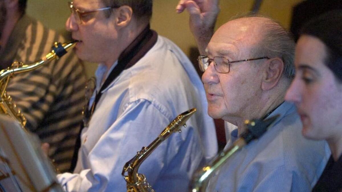 Big band leader Ozzie Fuhrmann, 94, center, will bring his three-generation band to Tacoma Little Theatre Thursday for an all-ages night of classics from the 1930s and 1940s to fund the community theater’s Club TLT education program.