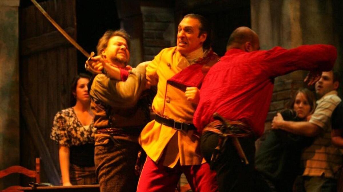 Craig Grayson, center, rehearses the part of Zuniga in the last Tacoma Opera production of Georges Bizet’s “Carmen” in 2007. The opera will be part of the company’s 2017-18 season.