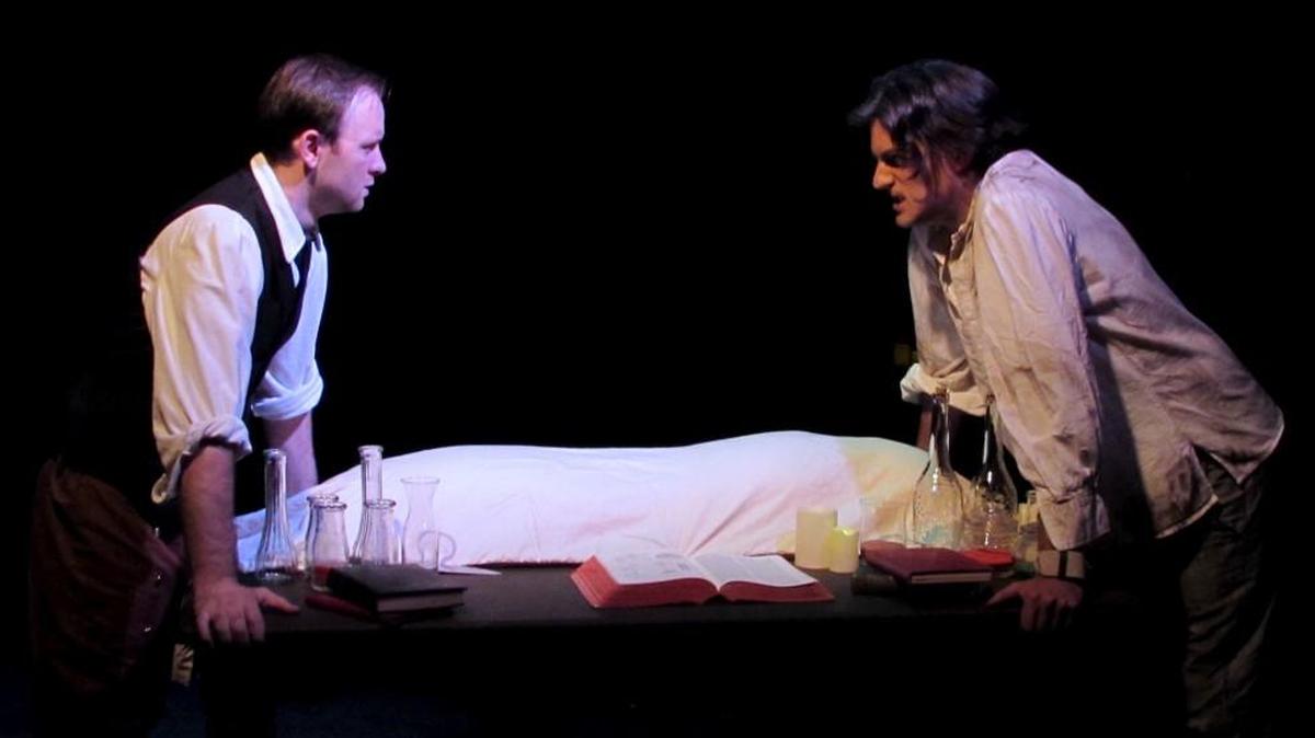 Niclas Olson, left, as Victor Frankenstein and Ben Stahl as the Creature in the New Muses Theatre Company’s production of “Frankenstein.”