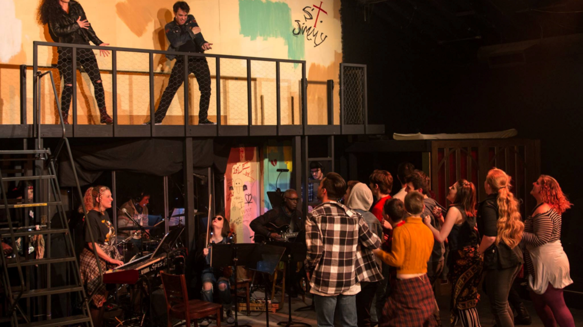 Shannon Burch, as St. Jimmy, and Mark Alford as Johnny in the Lakewood Playhouse production of Green Day’s “American Idiot.”
