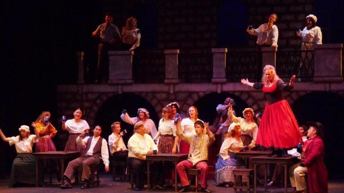 
The cast of “Oliver” takes the stage at Tacoma Musical Playhouse.
