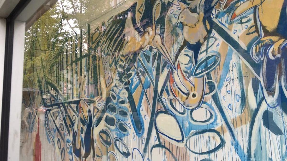 A giant mural by Lauren Bollini fills the southernmost Woolworth Window in downtown Tacoma.