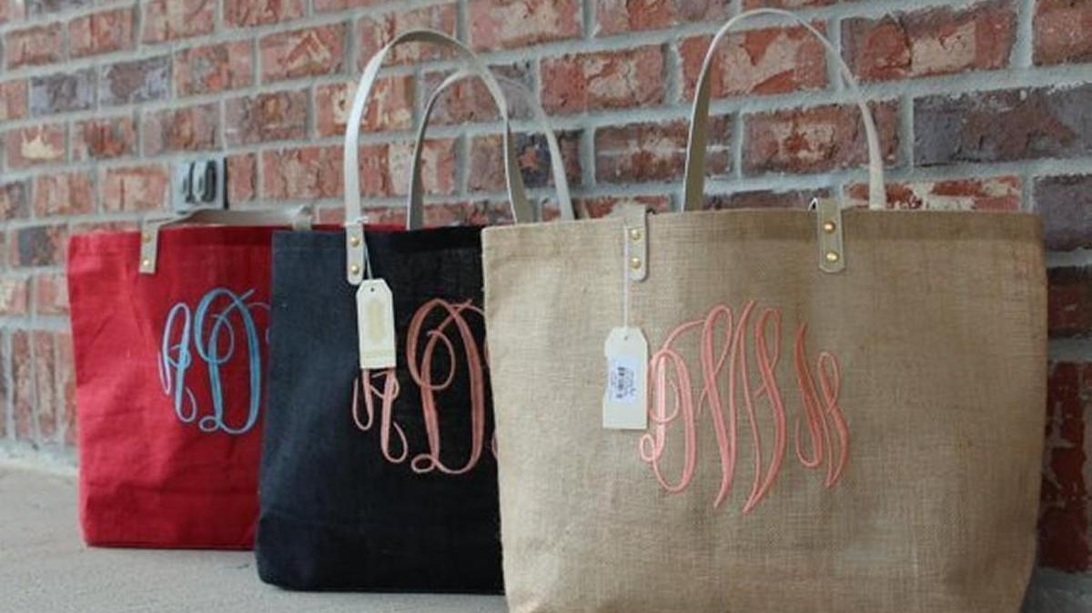 Monogrammed jute bags made by Tim and April Norris, two local artists who helped get Tacoma named an Etsy Maker City for 2016.
