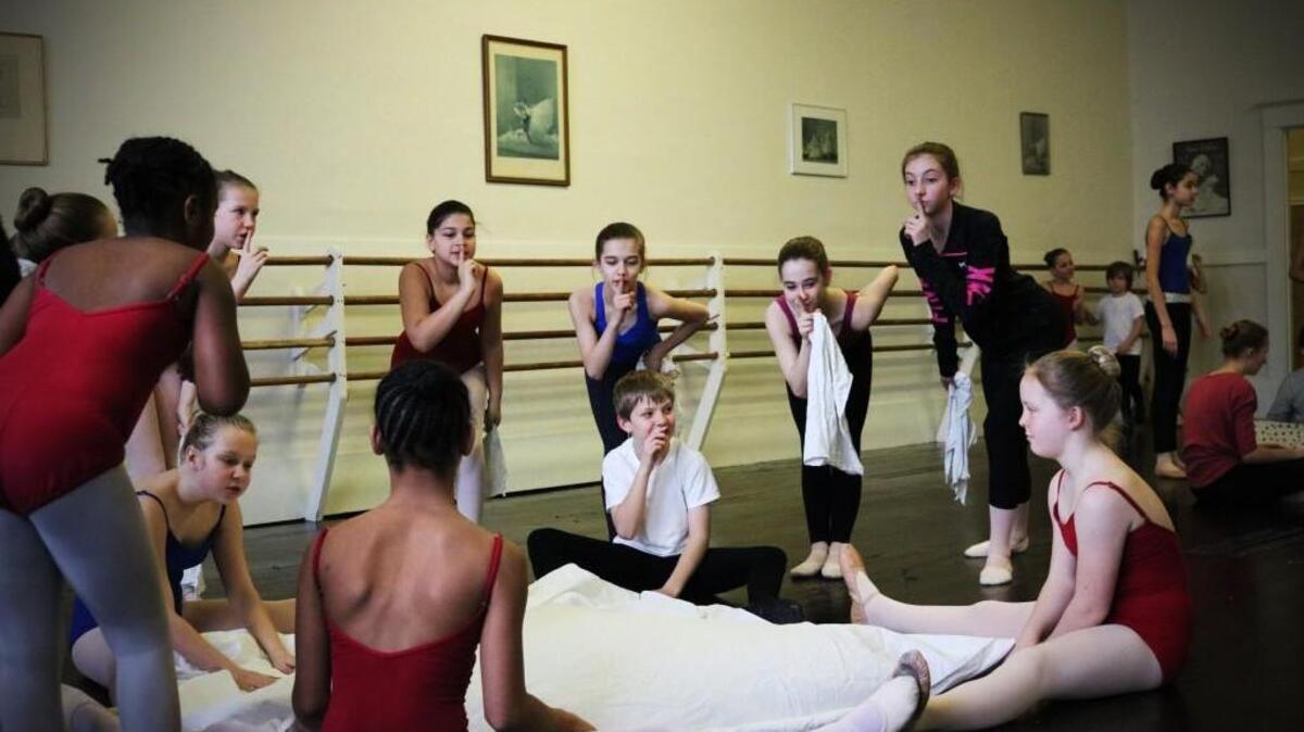 Tacoma City Ballet junior company rehearses a scene from “Little Orphan Annie.”