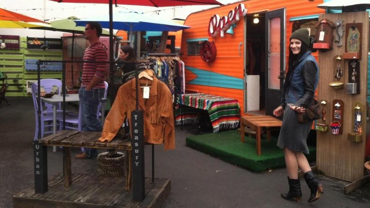 
One of the vendors at the Georgetown Trailer Park Mall, a weekend flea market held in retro trailers in a parking lot.
