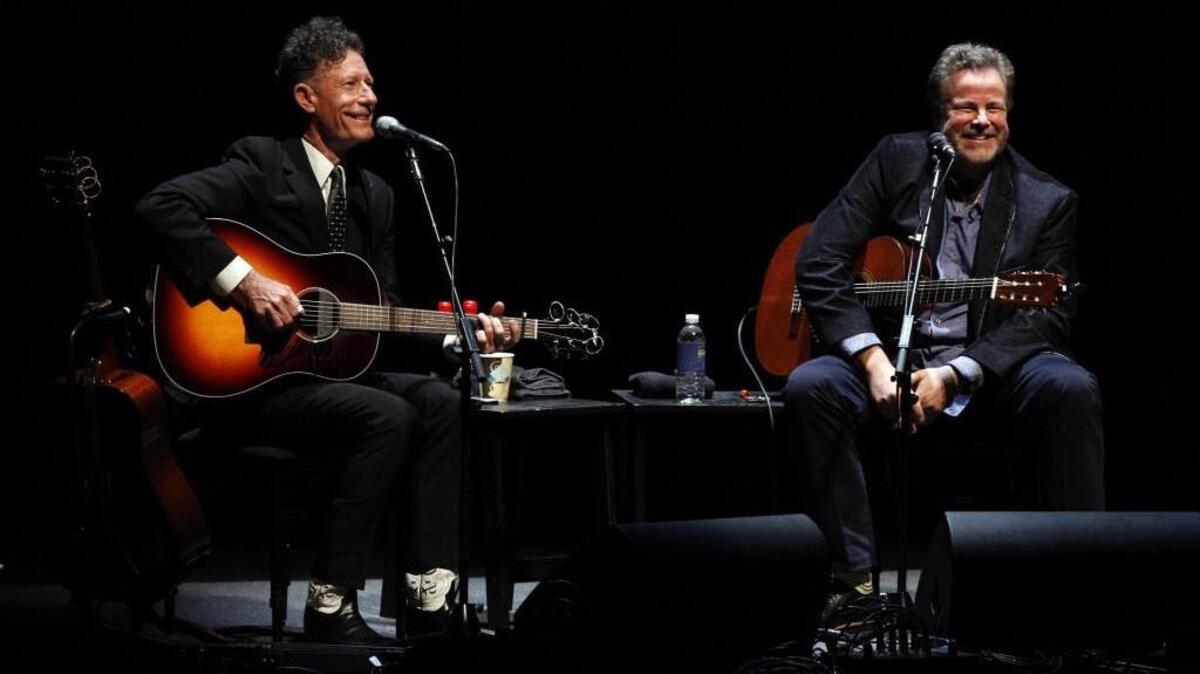 Lyle Lovett and Robert Earl Keen perform at Bass Performance Hall in 2013.
