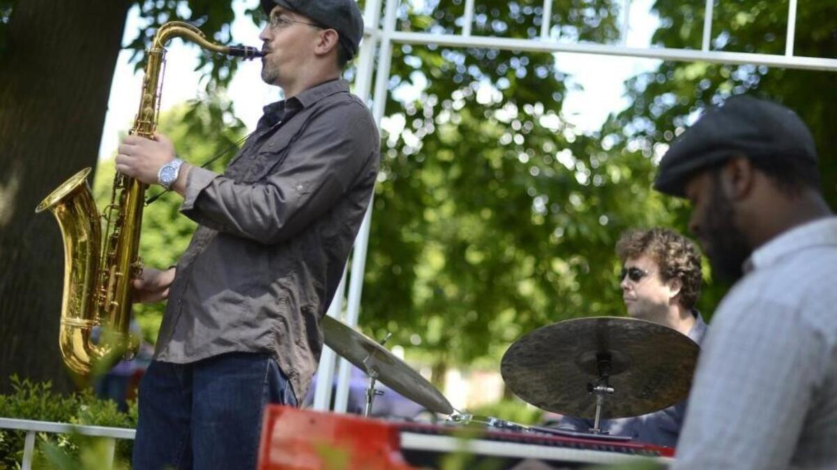 Kareem Kandi, Julian MacDonough and Delvon Laman, from left, members of the Kareem Kandi Band perform jazz