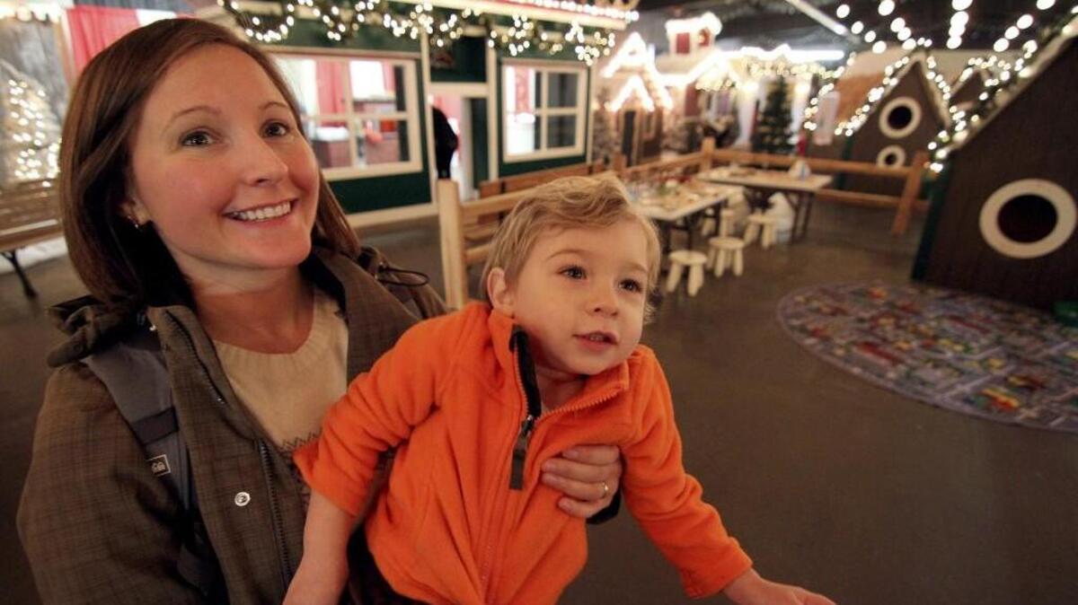 Mom Emily Roeben of Tacoma, was at the North Pole at the Fair event .