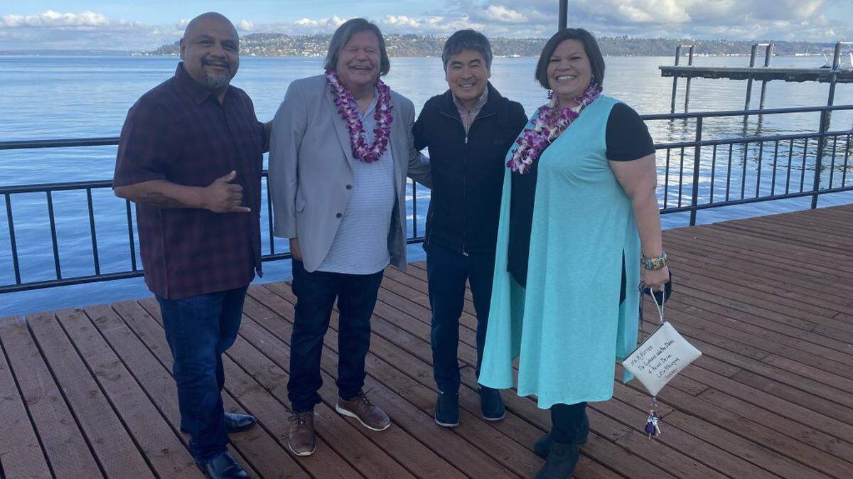The Puyallup Tribe of Indians will open a restaurant with celebrity chef Roy Yamaguchi in 2023 at 3017 Ruston Way in Tacoma, Wash. From left to right, Tribal councilman Fred Dillon, chairman Bill Sterud, chef Yamaguchi and councilwoman Anna Bean stand on the deck of the former C.I. Shenanigan’s.