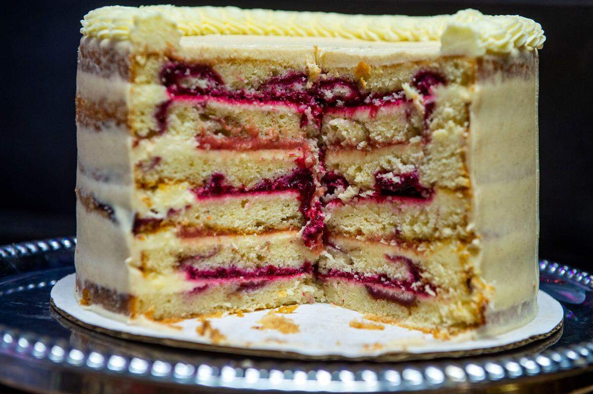 The sliced “cake guts” of a multi-layered treat features cranberry coffee cake at The Cat & Rabbitt Cake Shop on Tacoma’s Sixth Avenue.