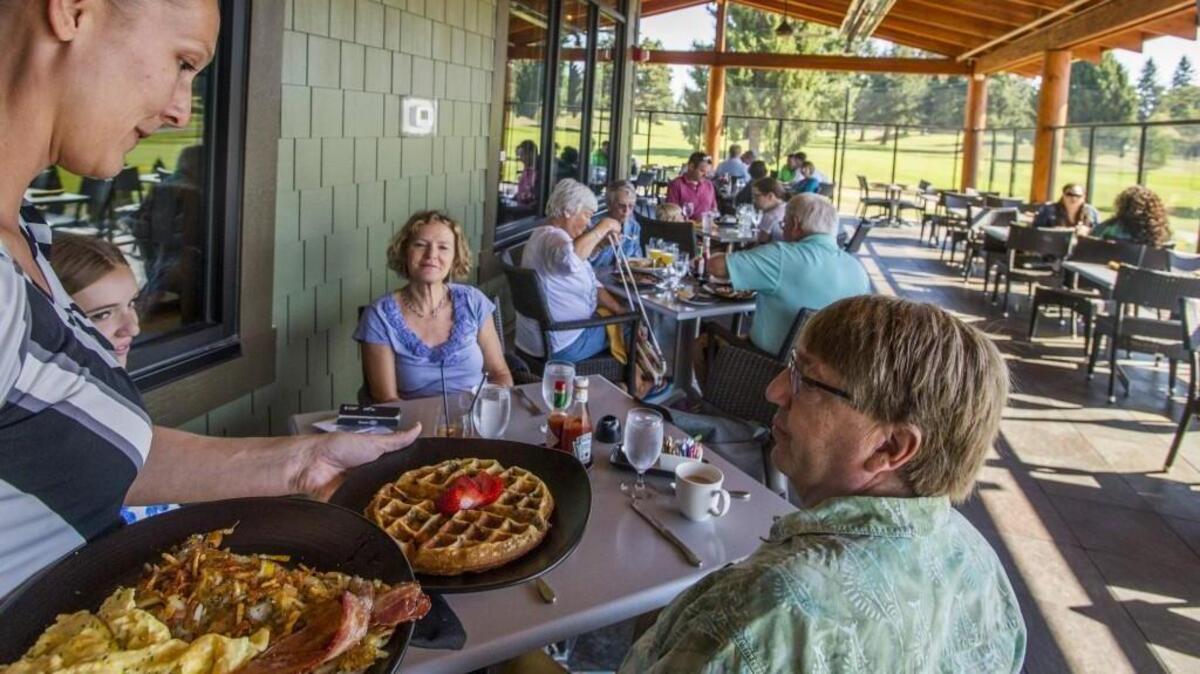 Sunday brunch is served on the deck at Smoke + Cedar overlooking the Allenmore Golf Course in Tacoma on September 7, 2014. A few of the dishes from that restaurant, which closed in October 2015, will be featured on the brunch menu at sister restaurant, Pacific Grill. Brunch begins this Sunday at the restaurant in downtown Tacoma.