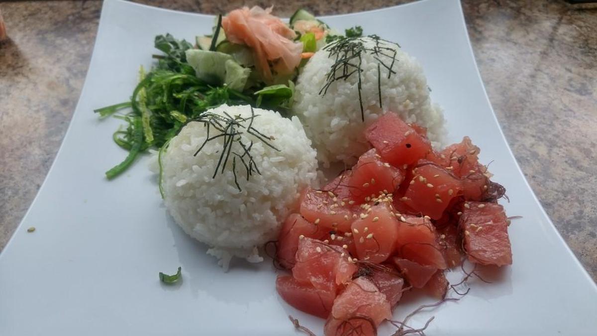 A traditional ahi poke plate from Sam Choy’s Poke to the Max. The mobile and brick-and-mortar locations of this restaurant specialize in poke and other Hawaiian fare.
