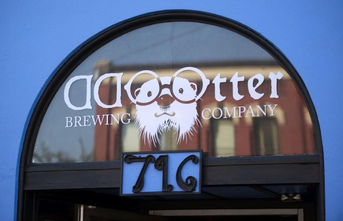 The logo of Odd Otter Brewing features a bespectacled rendition of its featured character.