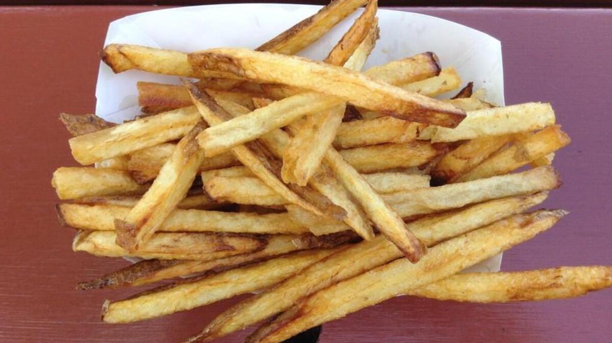 
Pick-Quick Drive In in Fife hand cuts its fries, then soaks them to leach out all the starch. Hot out of the fryer, they’re fantastic. The texture turns less crispy after the fries sit for a bit, but the flavor is pure potato. $2.35
