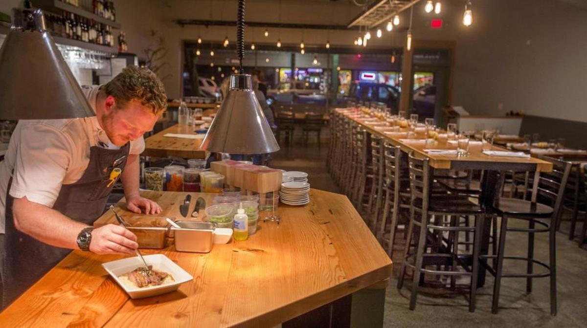 Derek Bray of The Table, 2715 6th Ave. in Tacoma, was selected as a semifinalist in the 2024 James Beard Awards in the Best Chef: Northwest and Pacific category. In this staff file photo, Bray is shown in the open kitchen shortly after opening the restaurant in 2015.