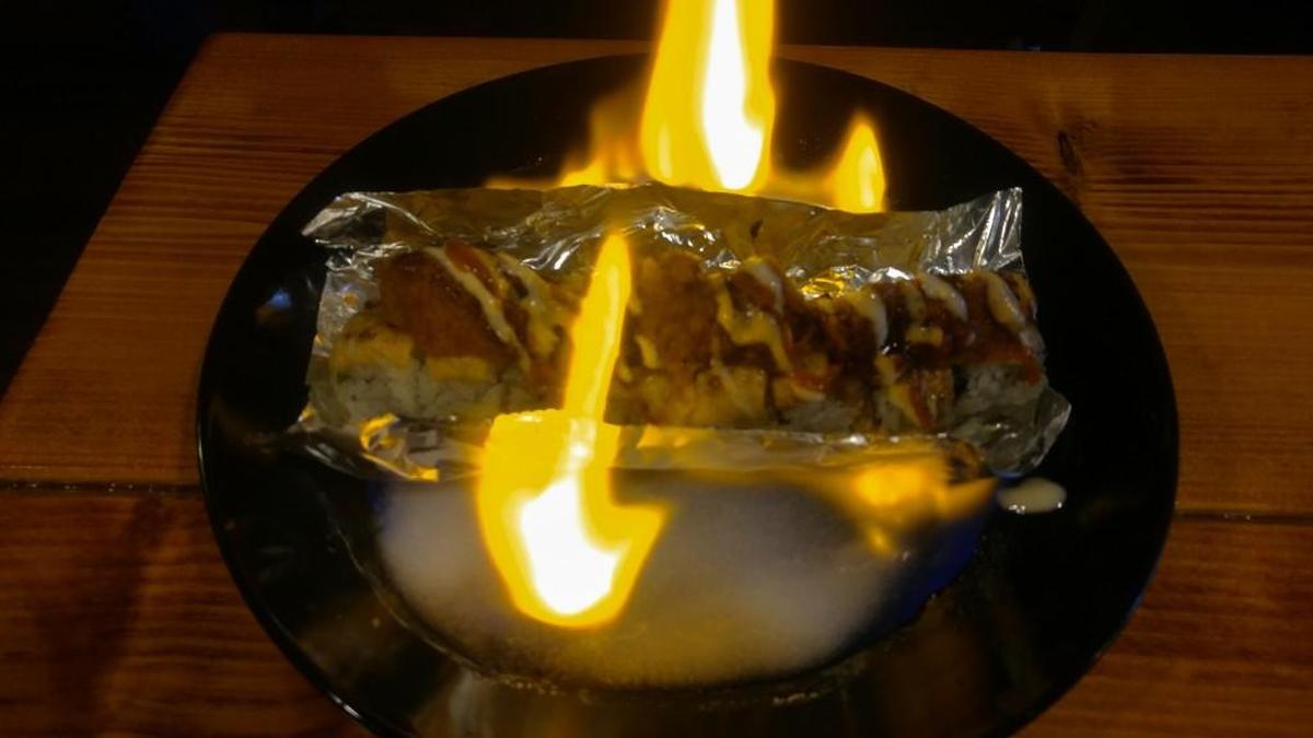 The fire roll at Sushido comes topped with minced spicy tuna.