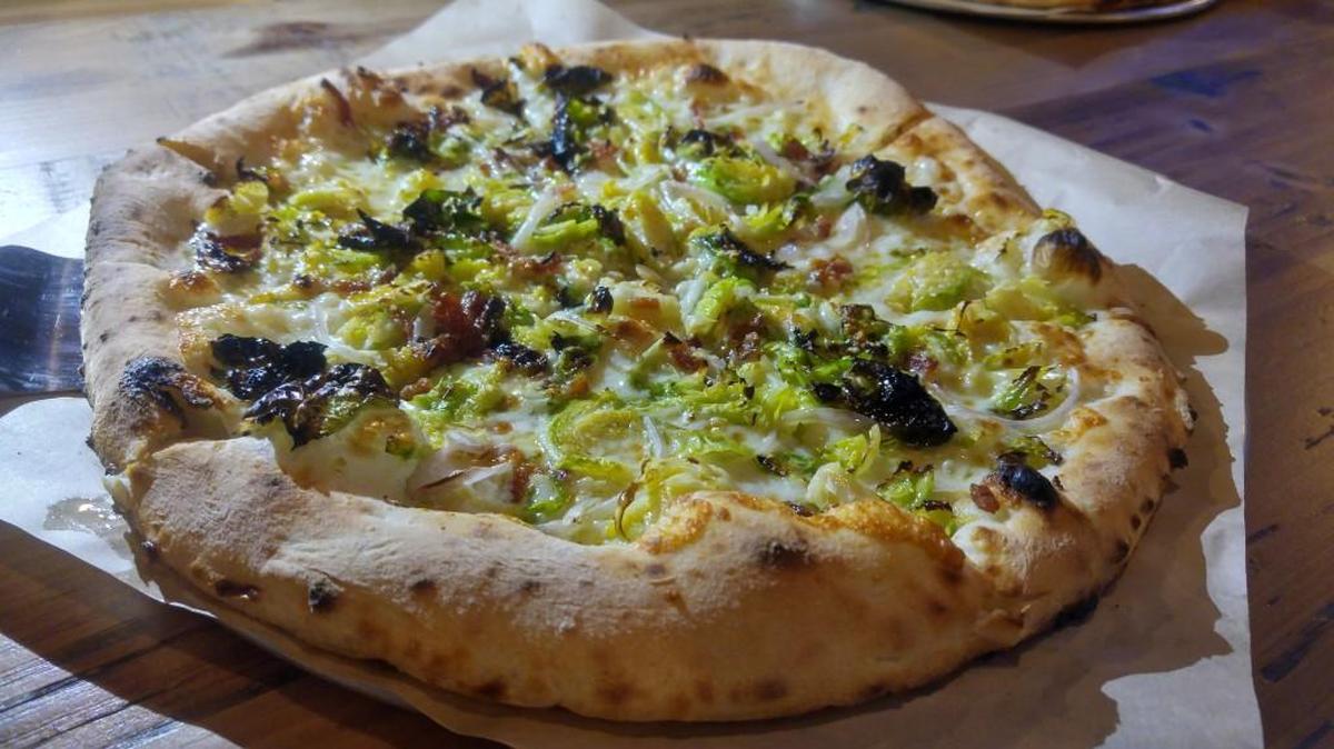 A Brussels sprouts and bacon pizza from The Carlson Block in Wilkeson.