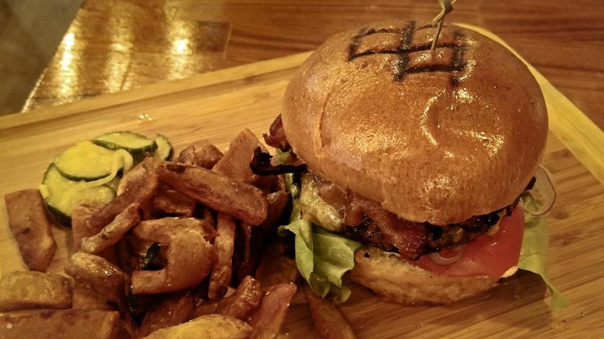 A half-pound Wagyu style burger with Tillamook extra sharp cheddar, with a side of thick-cut fries from The Mill Restaurant and Sports Bar in Milton. The restaurant opened June 8.