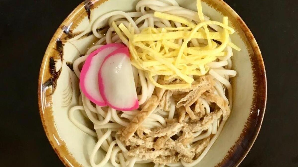 Udon soup from the Tacoma Buddhist Temple is made with a homemade broth, chewy noodles, tofu, egg and fish cake.