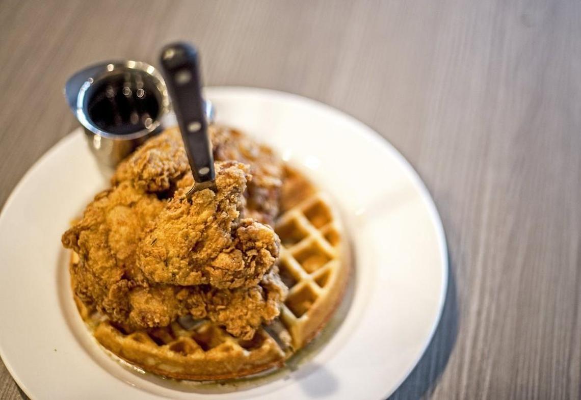 A plate of chicken and waffle sits on the table at Pacific Southern, 3832 S. Pine St., Tacoma, on Oct. 7. The secret to the Tacoma restaurant’s fried chicken is the flour mix, said executive chef Robert Walpole.