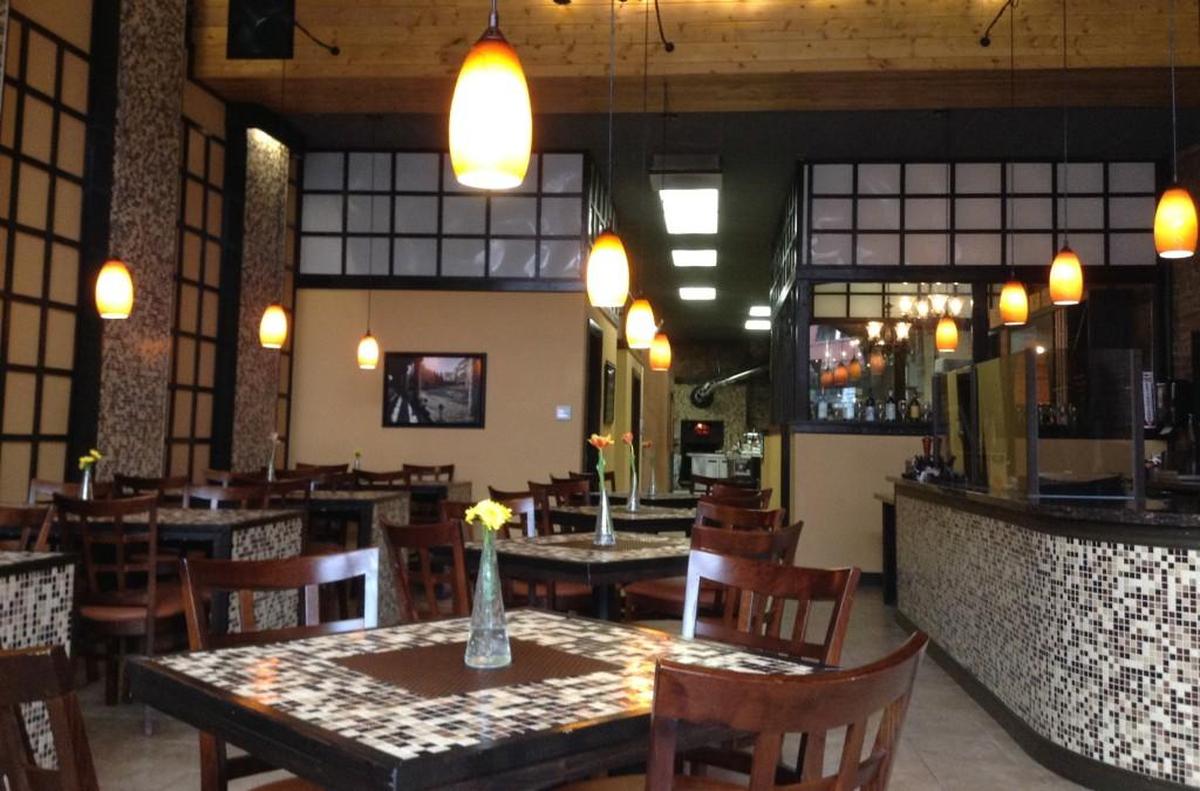 The dining room of the former Wilder Local Fare + Libations in downtown Tacoma. The restaurant previously was called Cafe Vincero. The new owners have transformed the dining room for Wooden City, which will officially open next week.