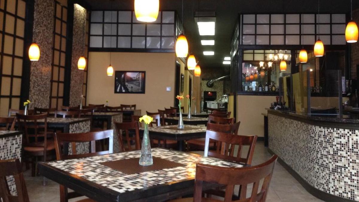 The dining room of the former Wilder Local Fare + Libations in downtown Tacoma. The restaurant previously was called Cafe Vincero. The new owners have transformed the dining room for Wooden City, which will officially open next week.