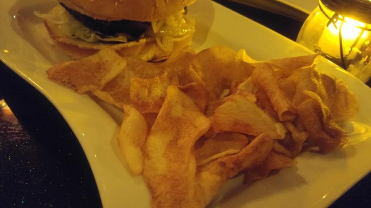 Wispy potato chips are freshly house fried at The Speakeasy Lounge.