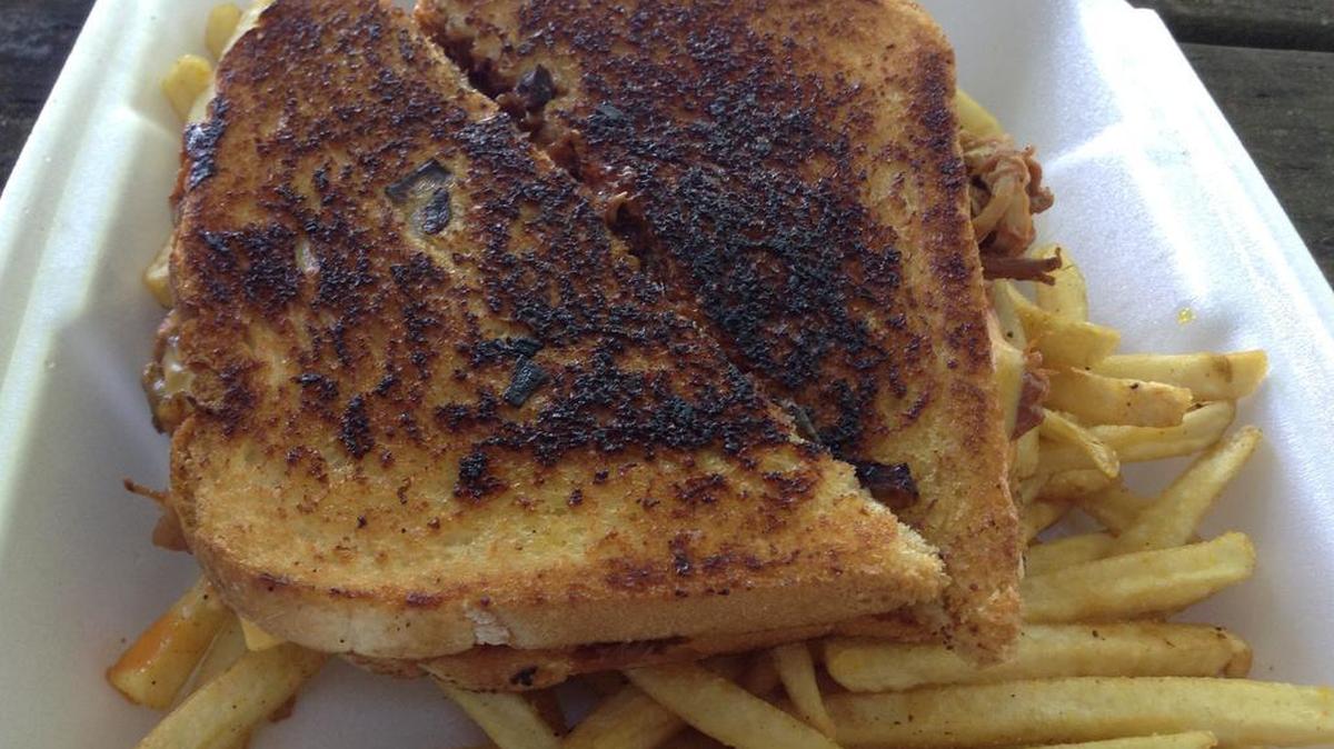 A grilled cheese sandwich with pulled pork from the Hamhock Jones Soul Shake food truck.