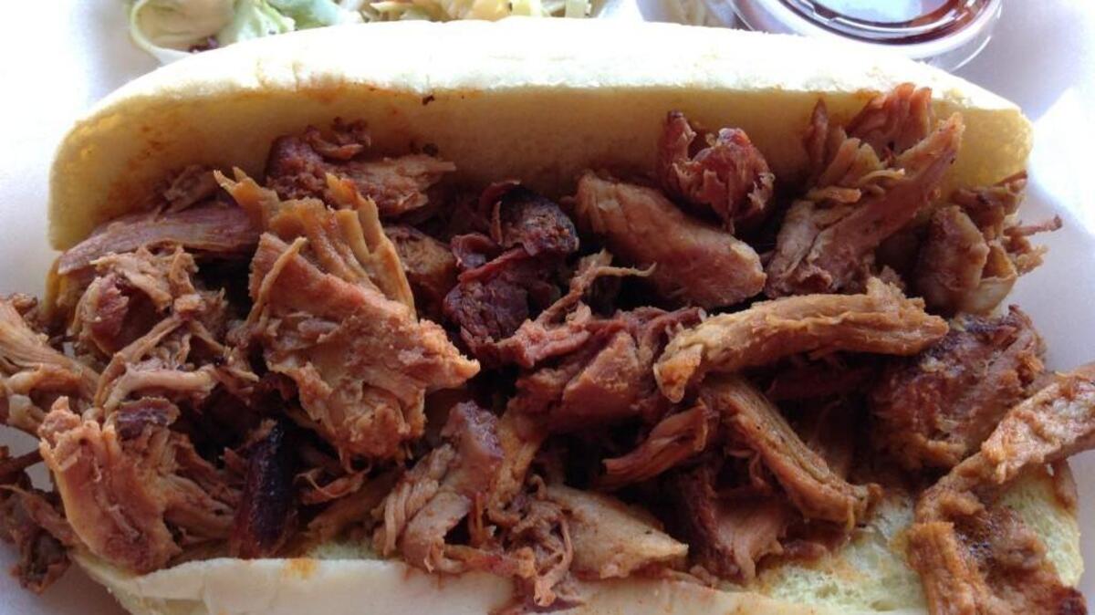 A pulled-pork sandwich from Smokin’ Zee’s BBQ when the truck served at Narrows Brewing in Tacoma. The restaurant is opening a brick-and-mortar location in Lakewood.
