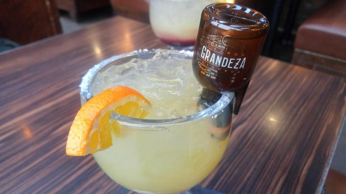 A bottle of Grandeza orange liqueur is tipped into a margarita tableside at Moctezuma’s Mexican Restaurant. The restaurant has locations in Tacoma, Gig Harbor, Silverdale and Tukwila.