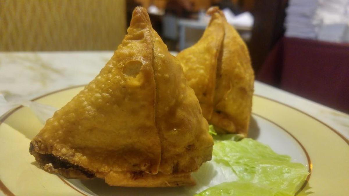 Potato-filled samosa pastries from Karma Indian Cuisine in South Hill.