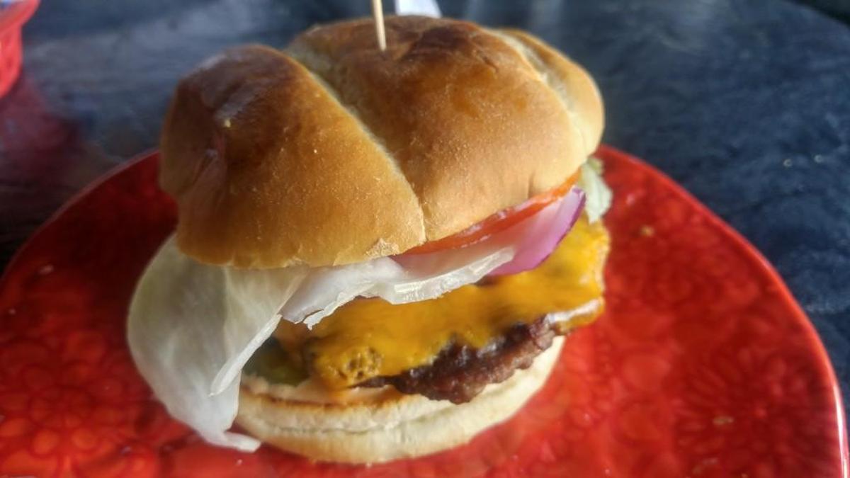 A $5 burger with cheese from The Camp Bar in Tacoma.