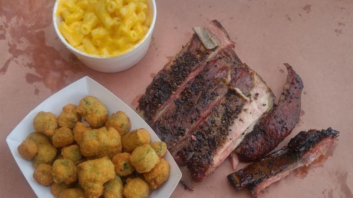 A Texas tray, a combination meal at BBQ2U in Gig Harbor, with four ribs, fried okra and macaroni and cheese.