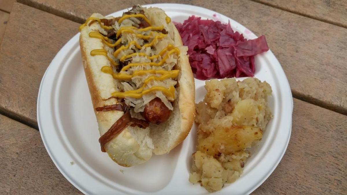 Bratwurst from the Zieglers Bratwurst booth at Oktoberfest Northwest. Served with hot German potato salad and cabbage.