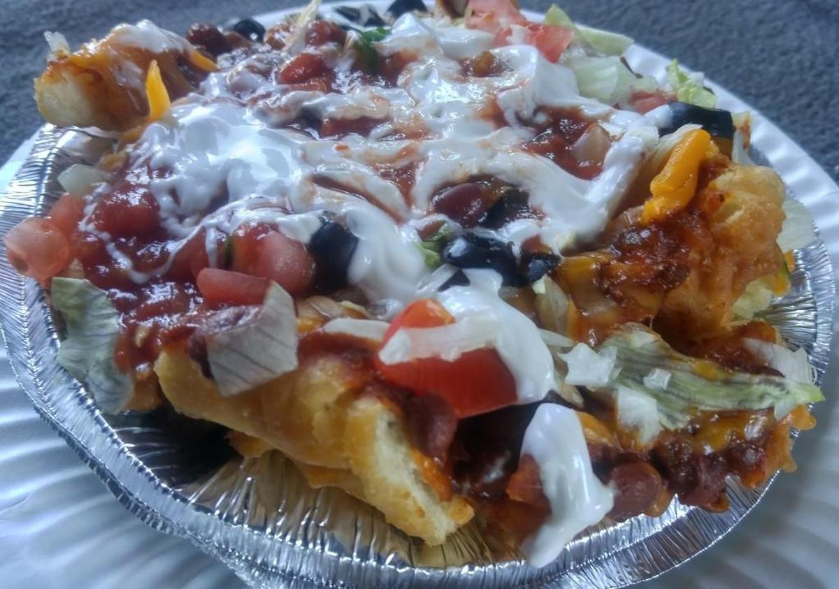 The Frybread Factory loads frybread bites with chili, cheese, veggies and sour cream.