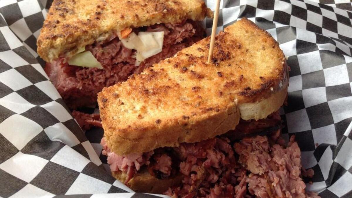 
Also a specialty at Liz Gilham’s former restaurant, Boxcar Grill, Midland Eatery features a Reuben made with Gilham’s house-made corned beef. She slices the corned beef thinly and piles it high on the sandwich, which is dressed with coleslaw, not the typical sauerkraut. 
