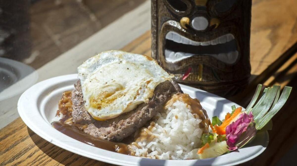 The Loco Moco plate, a Hawaiian classic of a hamburger patty and gravy topped with a fried egg at Da Tiki Hut on Sixth Avenue.