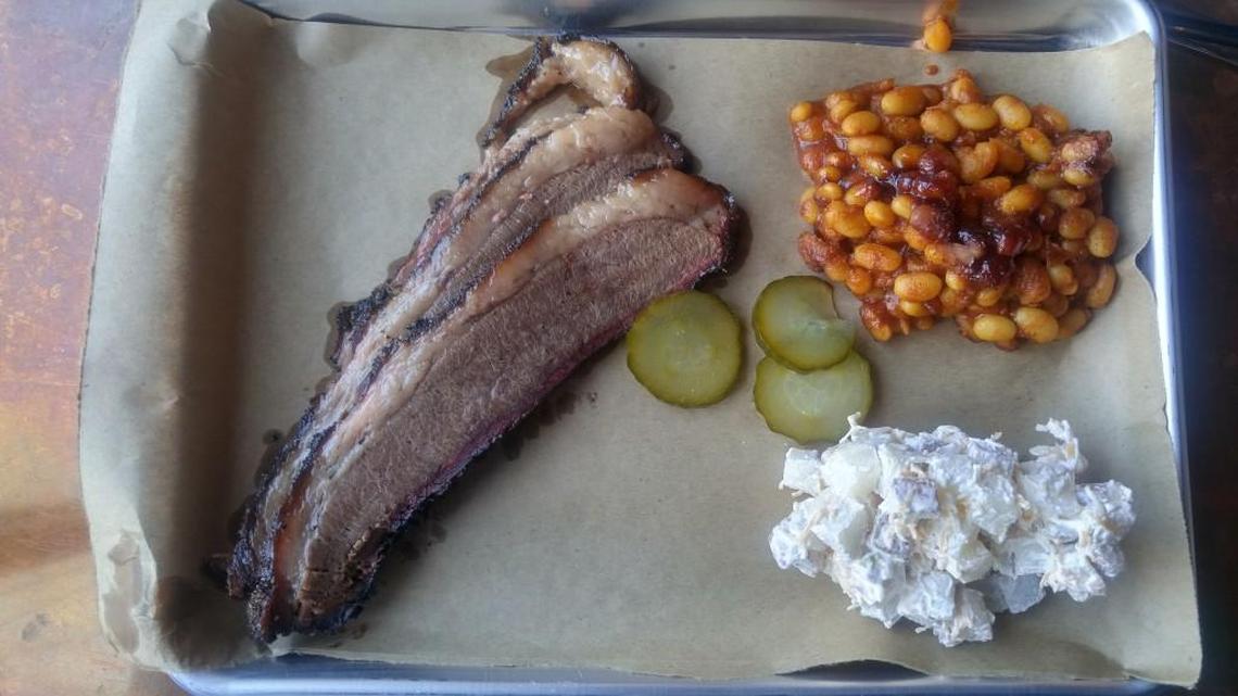 A brisket plate with beans and potato salad from My 4 Sons BBQ in Midland.
