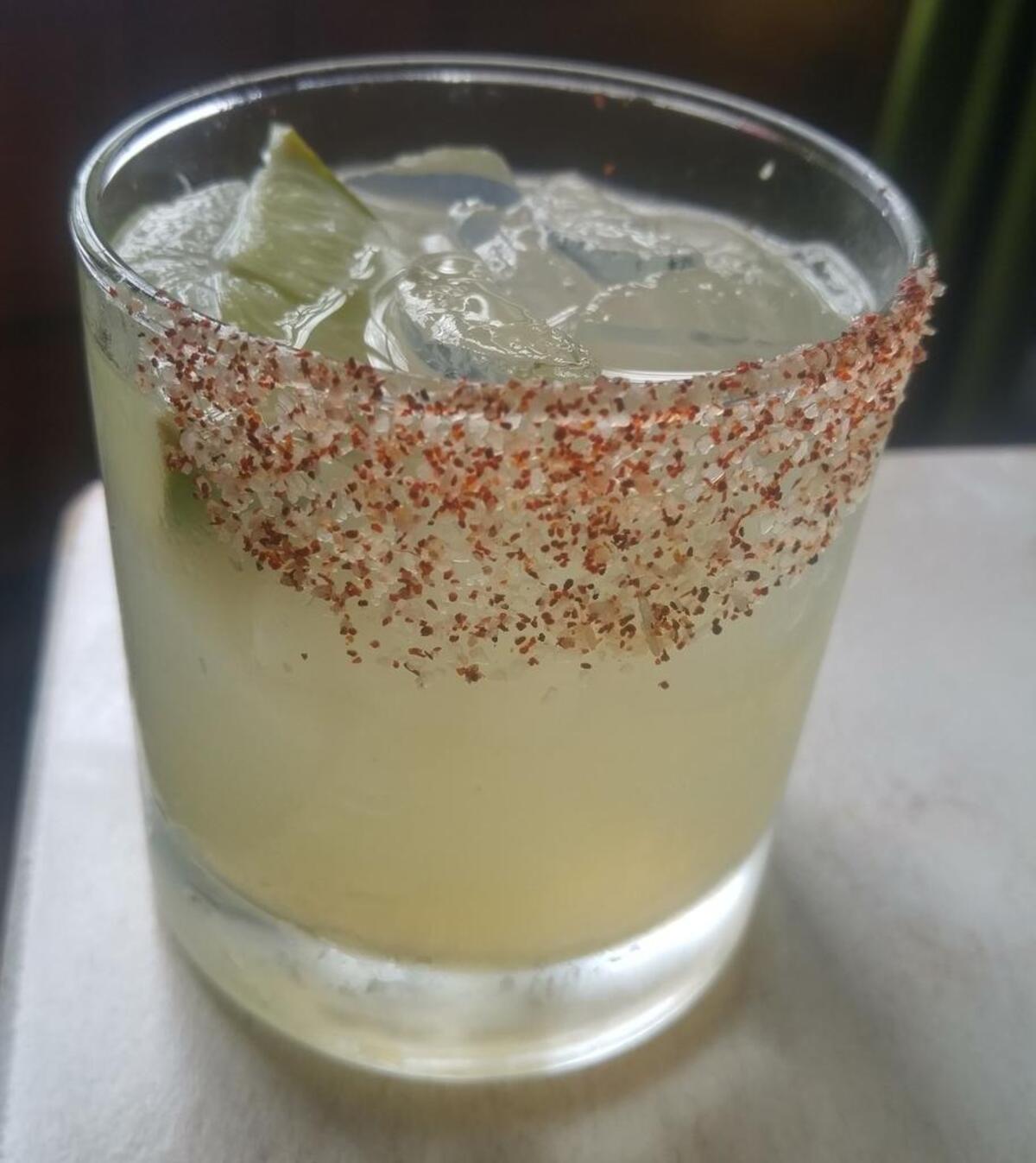 A hot pepper margarita with a spicy salted rim from Casco Antiguo.