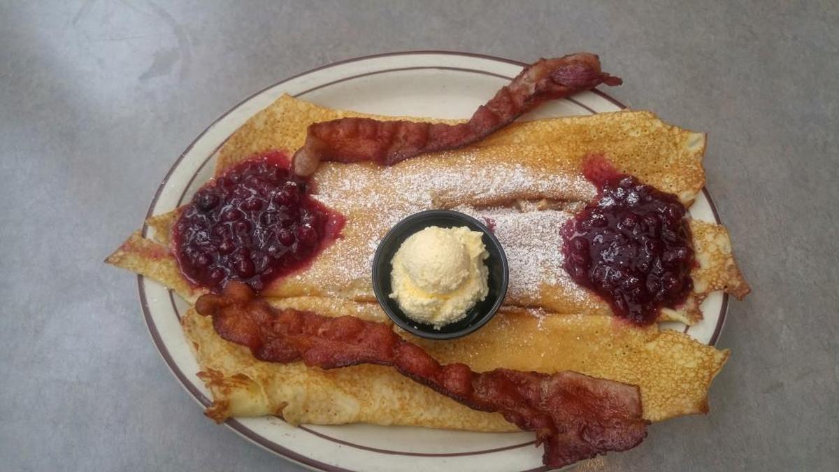 The Harvester Restaurant serves its Swedish crepes with Roland brand lingonberries, plus bacon.