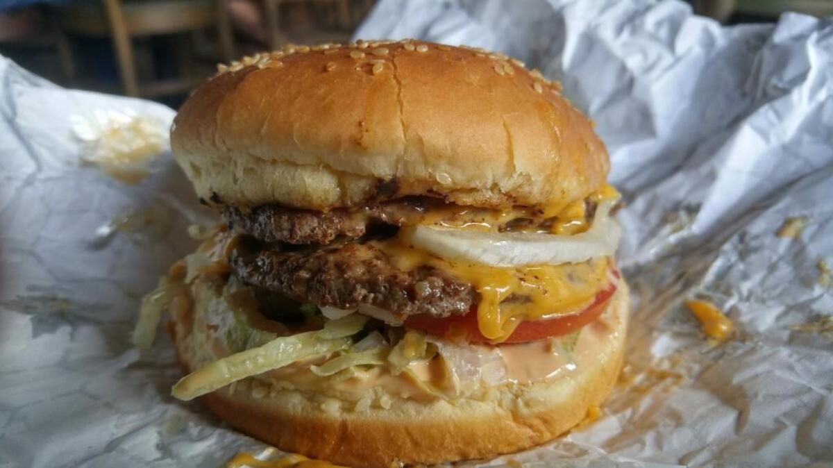 A Reggie Hammond burger from Boss Mama’s Kitchen comes with a special sauce named after the Eddie Murphy character from “48 Hours.” The truck is also named Reggie Hammond.