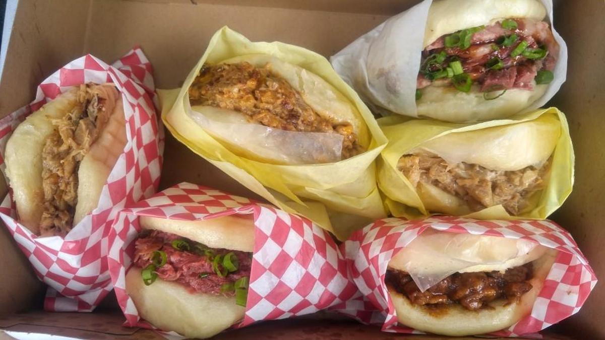 A box of tacopuas, a blend of Hawaiian and Samoan food, at Taste of Samoa Manapua Bakery in Parkland.